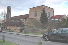 Alternative view of St Michael & All Angels Parish Church from the southeast, on Jack Staw's Lane. NewMarston StMichael&AllAngels southeast.JPG