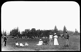 Norfolk Islanders gathering at a cricket match in November 1908. Norfolk Island - watching cricket (2807965734).jpg