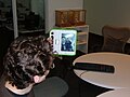 One Laptop Per Child OLPC AP1, Chris Ball, Richard, screen in ebook mode with webcam running. Nov 2006.