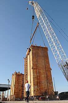 Cofferdam containment dome under construction at Wild Well Control in Port Fourchon, Louisiana on April 26. Wild Well has built all of the containment devices used in the spill to date. Oil containment chamber Port Fourchon LA 100426-G-8744K-021.jpg