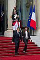 Carla Bruni-Sarkozy et Nicolas Sarkozy quittant le palais de l'Élysée