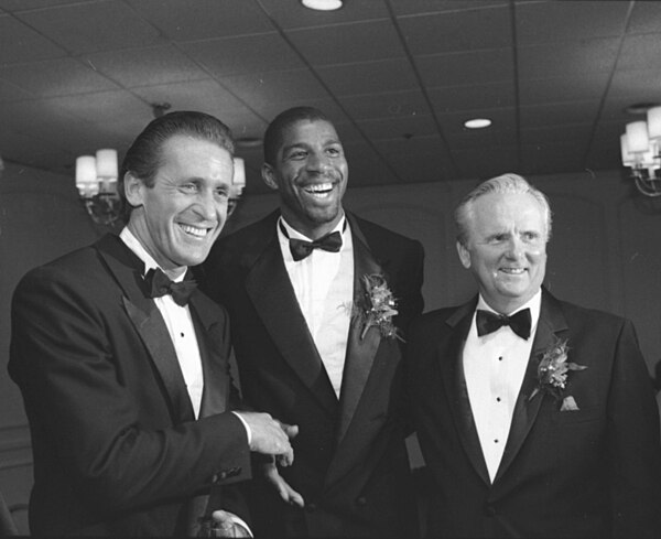 Head coach Pat Riley (left, with Magic Johnson, 1989) coached the Lakers to four NBA championships.