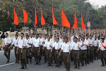 Members of Rashtriya Swayamsevak Sangh, a Hindu right-wing, nationalist paramilitary organisation, marching with the Saffron Flag. 2016