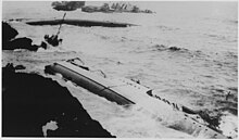 USS Delphy (foreground) broken in half at Honda Point Point Honda wrecks, vessel. - NARA - 295528.jpg