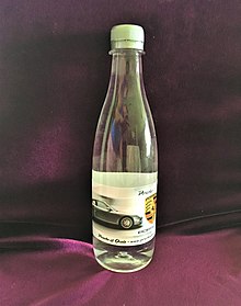 A promotional bottle of water from Porsche of Ocala in Ocala, Florida, USA Porsche promotional merchandize, a bottle of water.jpg