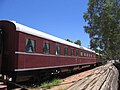 A narrow-gauge Ghan restaurant car retained at the Old Ghan Heritage Railway and Museum at Alice Springs in 2009