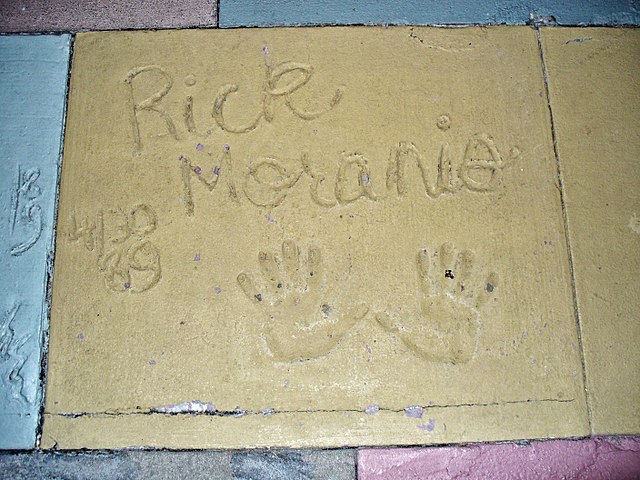 The handprints of Rick Moranis in front of the Chinese Theatre at Disney's Hollywood Studios in Walt Disney World
