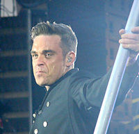 Born and raised in Burslem, Robbie Williams went on to sell over 57 million albums worldwide. Robbie Williams at Sunderland 2011a crop.jpg