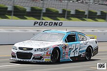 Sam Mayer driving down pit road in the No. 23 at Pocono in 2021 Sam mayer (51277146581).jpg