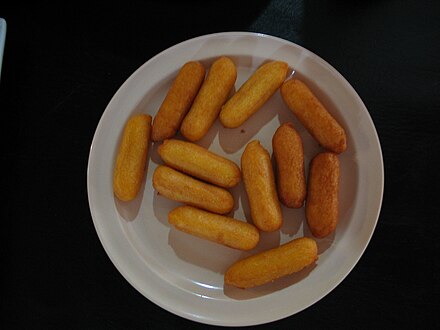 A plate with a dozen Puerto Rican "sorullitos" (hushpuppies) appetizers in Ponce, Puerto Rico