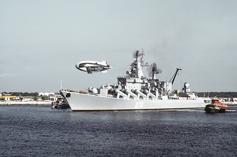 File:Soviet sailors man the rails aboard the Slava class guided missile cruiser Marshall Ustinov as the large harbor tug Chesaning (YTB-769) and a commercial harbor tug escort the vessel - DPLA - daadb416b151542046b833349fd5f3cc.jpeg