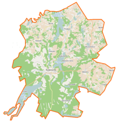 Mapa konturowa gminy Sulęczyno, na dole po lewej znajduje się owalna plamka nieco zaostrzona i wystająca na lewo w swoim dolnym rogu z opisem „Mausz”