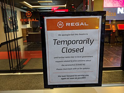 The sign on the door of a closed Regal movie theater in New York City, March 2020; Regal Cinemas reopened most of their theaters on August 21, 2020, re-closed them on October 8, 2020, and then reopened them again beginning on April 2, 2021.