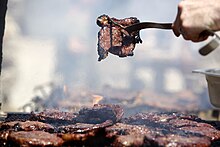 U.S._Marine_Corps_staff_noncommissioned_officers_with_Combat_Logistics_Company_28%2C_Combat_Logistics_Regiment_2_prepare_meat_for_their_company_barbecue_at_Camp_Dwyer_in_Helmand_province%2C_Afghanistan%2C_April_3_130403-M-KS710-111.jpg
