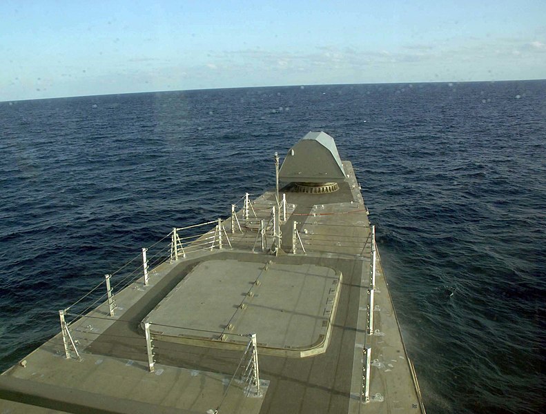 File:US Navy 100327-N-1876H-007 The enclosure for the non-line-of-sight missile system lies behind the Mk 110 57mm gun housing on the bow of littoral combat ship USS Independence (LCS 2) as they transits through the Gulf of Mexico.jpg