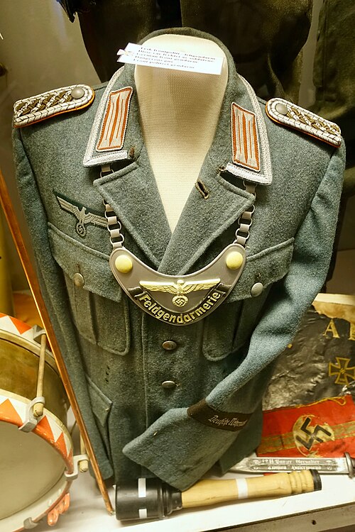 The uniform of the German Feldgendarmerie during WW2, complete with gorget.