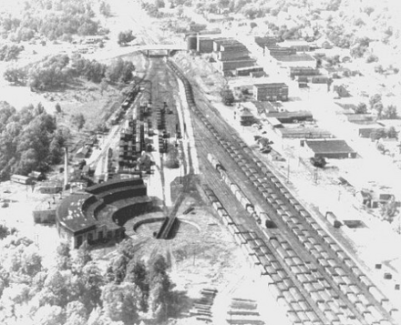 This aerial shot of Victoria was taken in 1954 looking west. It shows the turntable and roundhouse in the lower left, and the passenger station and Norfolk division offices to the right of the tracks.