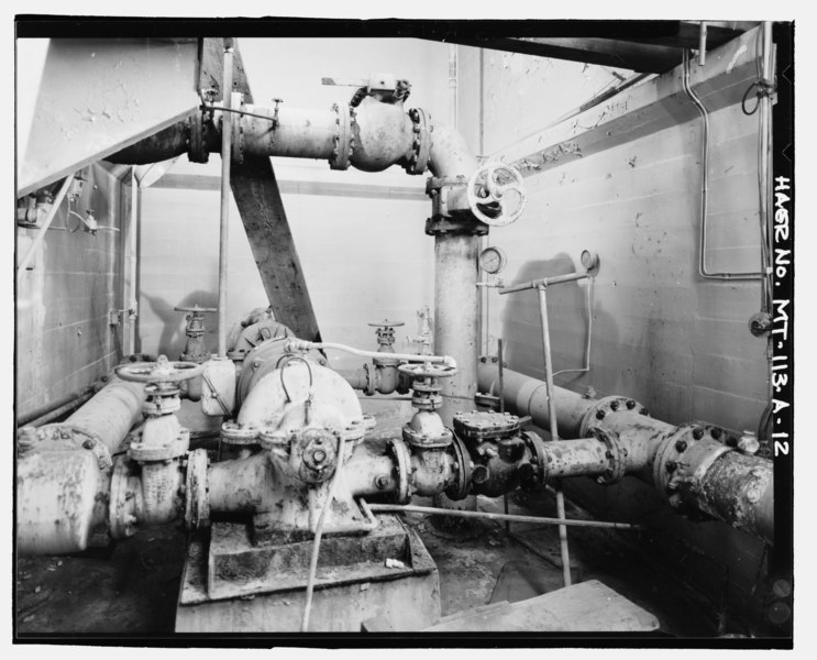 File:Water treatment plant interior view of pipes and pump in heater room. View to W - Fort Benton Water Treatment Plant, Filtration Plant, Lots 9-13 of Block 7, Fort Benton Original HAER MT-113-A-12.tif