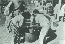 Women prisoners getting daily water rations in Plantungan camp c.1973 Women prisoners getting daily water rations in Plantungan camp from 1973 Amnesty International special issue.png