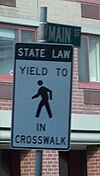 In many jurisdictions in the United States, one must yield to a pedestrian in a crosswalk. Yieldpeds.jpg