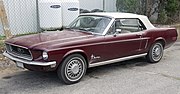 1968 Ford Mustang Convertible in Maroon, front left.jpg