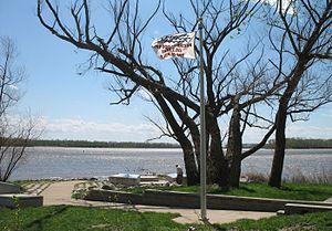 Flagpole with high water mark of the great flood of 1993