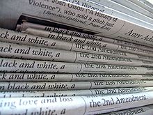 A_stack_of_newspapers.jpg