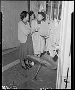 Arcadia, California. Mrs. Lily Okura taking in the wash and making new friends at the Santa Anita A . . . - NARA - 537402.jpg