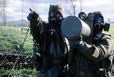 Canadian Army soldiers in CBRN hazmat suits with a Blowpipe man-portable air-defense system, 1987