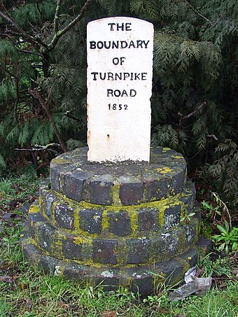 Turnpike marker 1852 showing southwest boundary of Ely