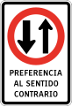 Give preference to vehicles coming from opposite direction (used at traffic bottlenecks)