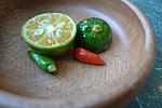 Labuyo chilis and calamansi are mixed with soy sauce, vinegar, and/or fish sauce at the diner's preference to create a dipping sauce (sawsawan)[14]