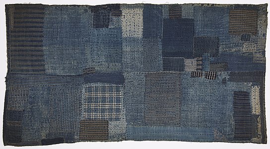 Child's shikibuton (sleeping mat), late 1800s. Boroboro (patchwork) quilted together with over-all sashiko (decorative stitching).