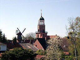 Picture of church and windmill in Ditzum, community of Jemgum, district of Leer, Germany.