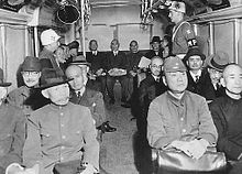 Class-A War Criminals in bus.JPG