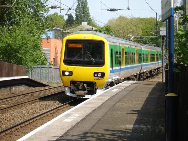 A Centro livery Class 323 arriving at University in 2007