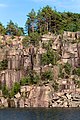 "Cliffs_in_Norrkila_old_granite_quarry_2.jpg" by User:W.carter