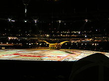 The "flying tram" featured in the Opening Ceremony, sitting on a Melbourne street map. Comm Games 2006 flying tram.JPG