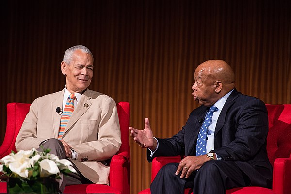 (L-R) Bond with John Lewis, US Representative from Georgia, at the Civil Rights Summit at the LBJ Presidential Library in 2014