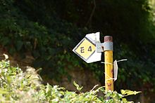 E4 European path sign in the village Ano Doliana of Arcadia, Peloponnese, Greece E4 Ano Doliana.jpg