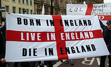 The flag of St George displayed at an EDL demonstration in Newcastle in 2010 EDL6.jpg