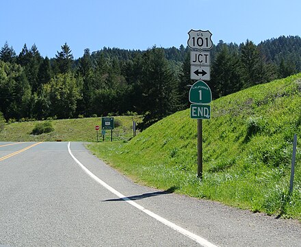 Signs marking the northern terminus of SR 1 near Leggett; the route was originally proposed to run further north, but these plans were abandoned to avoid the steep and unstable highlands of the Lost Coast region.
