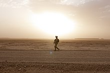 A Georgian soldier with the 31st Georgian Light Infantry Battalion scans for enemy activity while on patrol in the Helmand province. 16 April 2012. Flickr - DVIDSHUB - 31st Georgian Light Infantry Battalion (Image 3 of 35).jpg