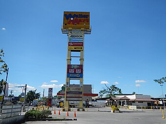 A sign listing the stores at Walter Mart Gapan