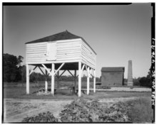 Winnowing barn at the Mansfield Rice Plantation, Georgetown, South Carolina GENERAL VIEW OF WINNOWING HOUSE. Rice Threshing Mill in background. - Mansfield Plantation, Winnowing House, U.S. Route 701 vicinity, Georgetown, Georgetown County, SC HABS SC,22-GEOTO.V,8A-1.tif