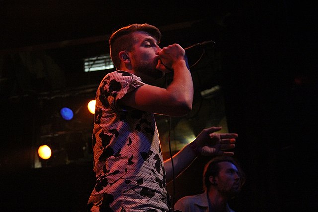 Former vocalist Trenton Woodley performing in 2015