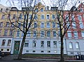 Apartment building in closed development with front garden