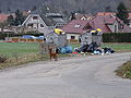 Čeština: Hlásná Třebaň, okres Beroun. Pod Svahem, z Mořinské k Ječné, popelnice a pes. English: Hlásná Třebaň, Beroun District, Central Bohemian Region, Czech Republic. Pod Svahem street, seen from Mořinská to Ječná street, trash bins and a dog. Camera location 49° 55′ 30.6″ N, 14° 11′ 50.7″ E    View all coordinates using: OpenStreetMap