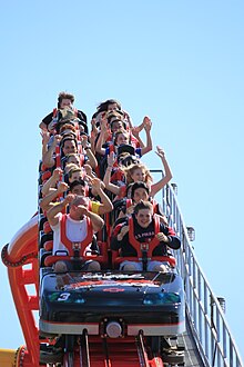 The silver train in the brake run, with the old restraints Intimidator 305 train in the brake run.jpg