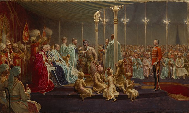 Investiture of the Star of India, Delhi (detail), by George Jacomb-Hood. King George V is depicted awarding the GCSI to Ganga Singh, Maharaja of Bikan